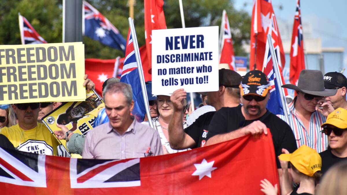 Rally for the Cali: hundreds take to the streets of Singleton for pub's roof flag. Pictures: Ethan Hamilton