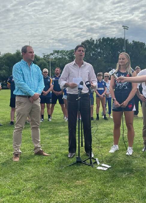 ANNOUNCEMENT: Upper Hunter MP Dave Layzell (centre) speaking alongside Muswellbrook Council Mayor Steve Reynolds (left) and Sydney Roosters player Brydie Parker (right) on Thursday, January 27. Picture: Mathew Perry