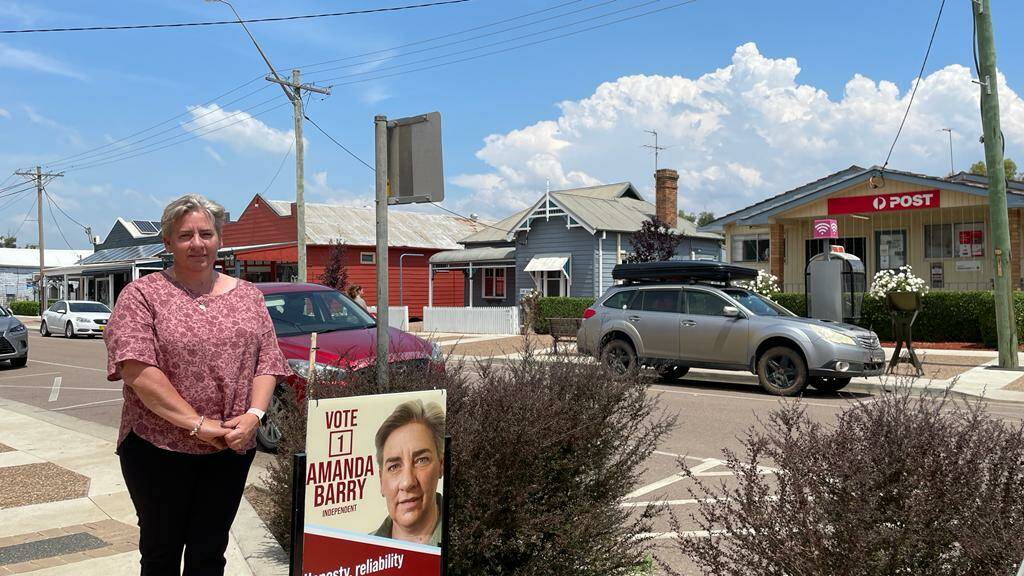 DENMAN: Muswellbrook Shire Council candidate Amanda Barry outside the polling centre at the Denman Memorial Hall on Saturday, December 4. Picture: Mathew Perry