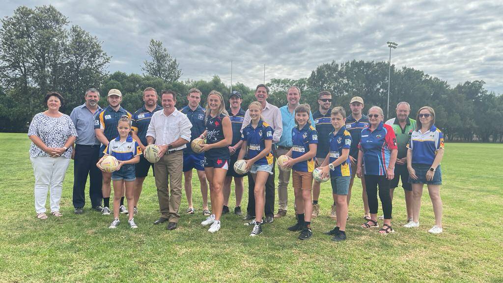 OLYMPIC PARK: NSW Deputy Premier Paul Toole, Upper Hunter MP Dave Layzell and Muswellbrook Mayor Steve Reynolds alongside members of the Muswellbrook Rams RLFC at Olympic Park on Thursday, January 27. Picture: Mathew Perry