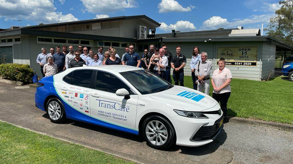 CHARITY: Sponsors from Upper Hunter businesses stand behind the vehicle donated to TransCare at the Bengalla Charity Golf Day on Friday, December 3 2021. Picture: Mathew Perry