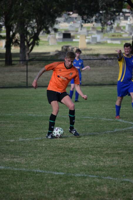 MOST OUTSTANDING: Josh Forrester (front) received the Most Outstanding and Player's Player awards for the Eagles' 2021 reserve grade side. Supplied: Muswellbrook Eagles FC
