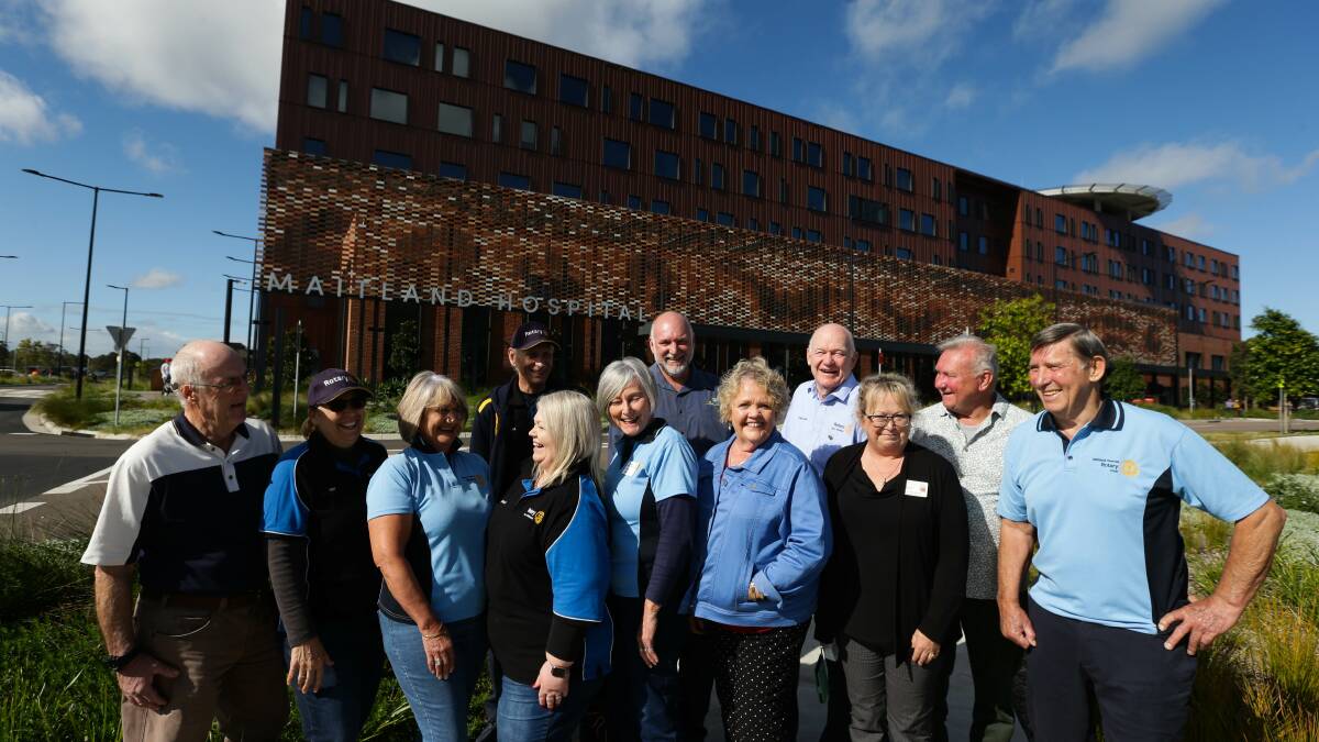 Members of Maitland's combined Rotary Clubs pictured in 2022 outside Maitland Hospital when HealthStays was first announced. Picture by Jonathan Carroll