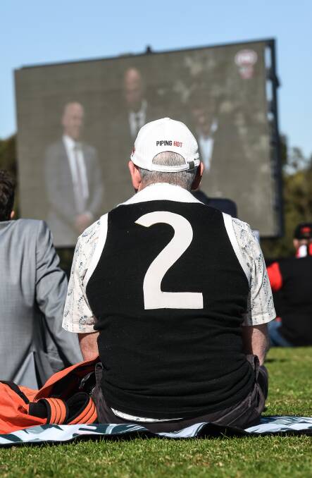 A fan watches on at Moorabbin wearing the famous number two.