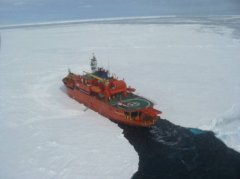 LAW AND ORDER: Aurora Australis fitted with a deck mounted machine gun to help police illegal fishing in 2004. Picture: Australian Antarctic Division. 