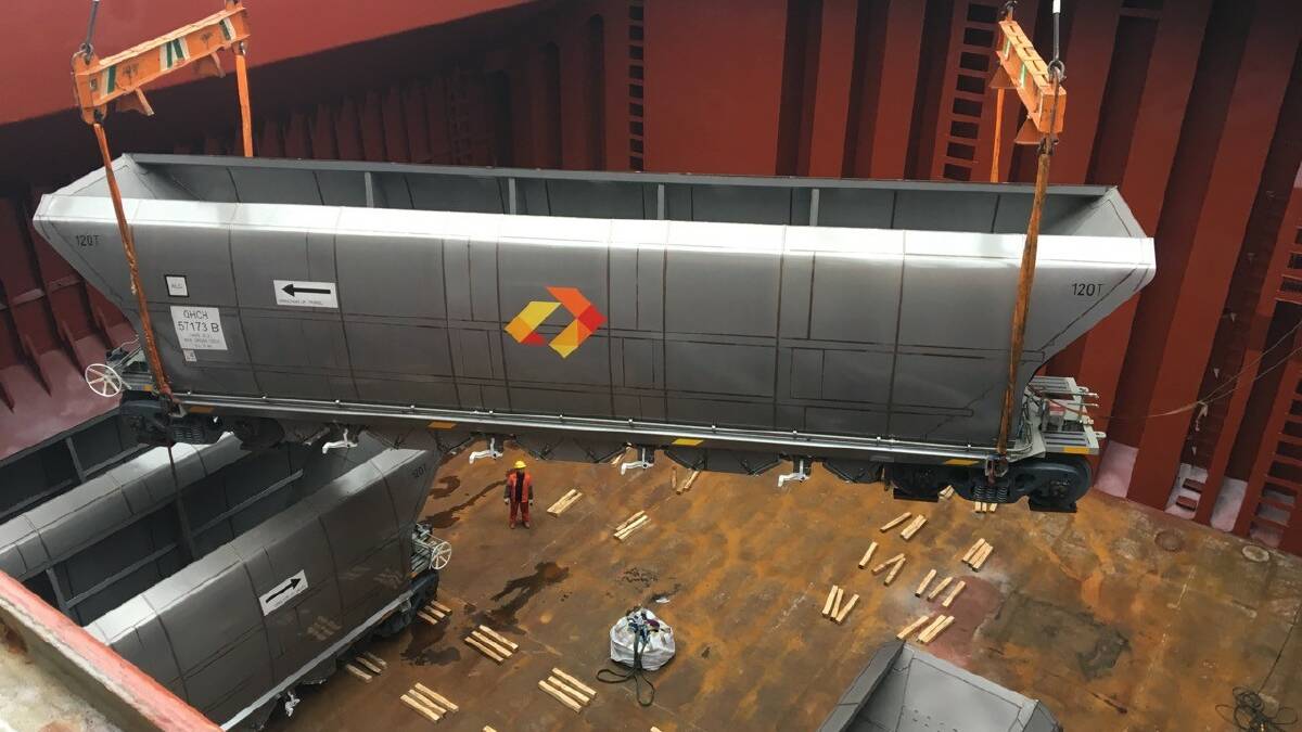 SPECIAL DELIVERY: Coal wagons being loaded for shipment to Newcastle before use by Aurizon to haul coal for mining company MACH Energy