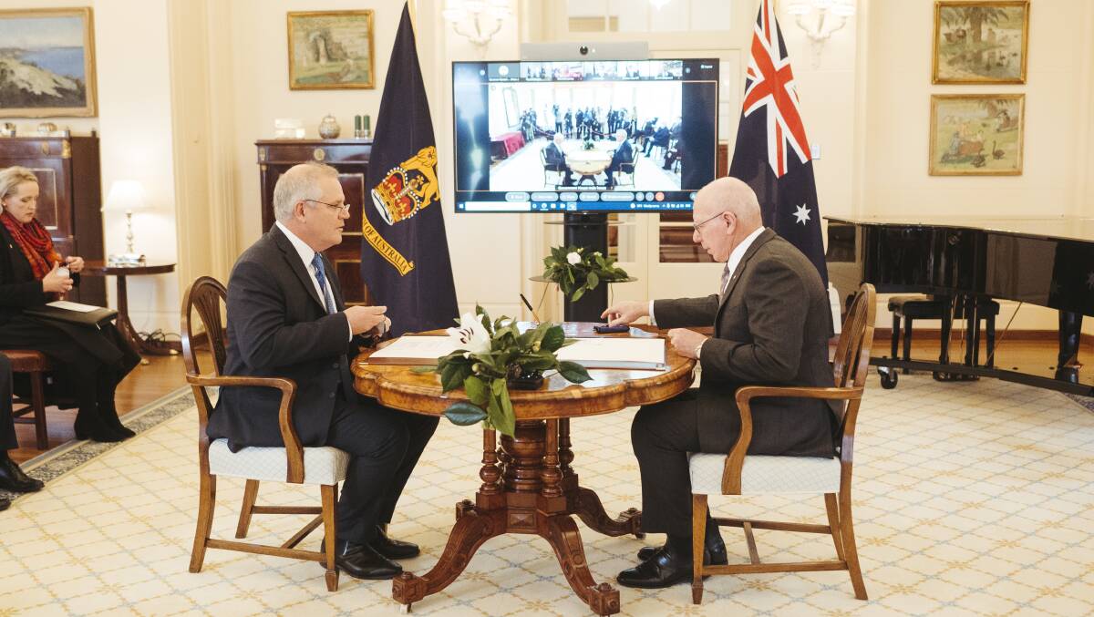 QUESTIONS: Scott Morrison and David Hurley at a ministerial swearing-in ceremony in July last year.