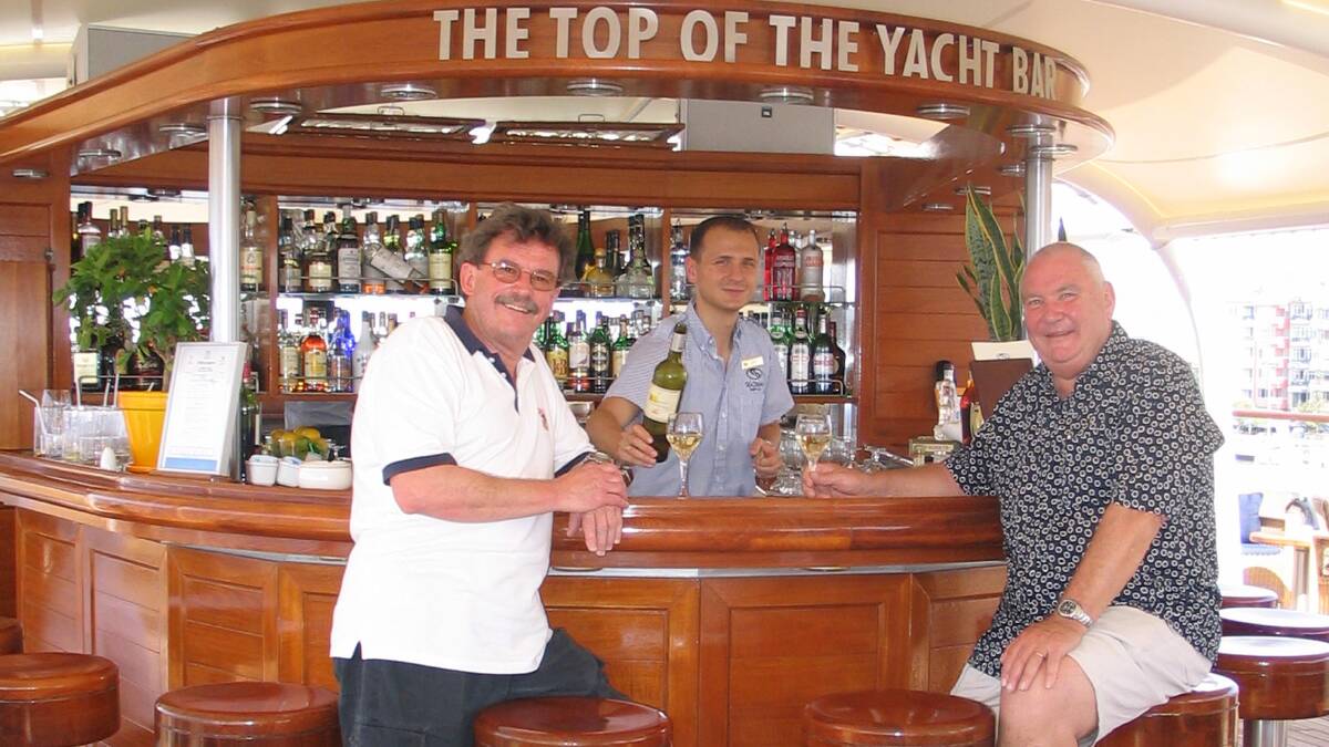 The late Malcom Andrews … at his favourite spot, SeaDream’s Top of the Yacht Bar. With him is media-contingent leader David Ellis. 