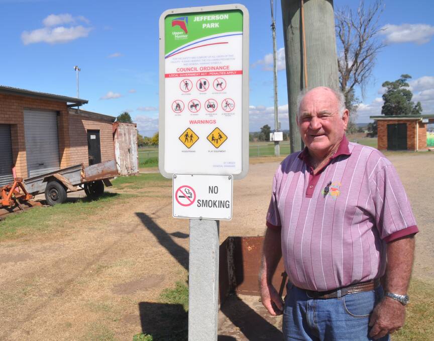 UPSET: Aberdeen Golf Club's Doug Dowell stands next to the sign at Jefferson Park on Thursday.