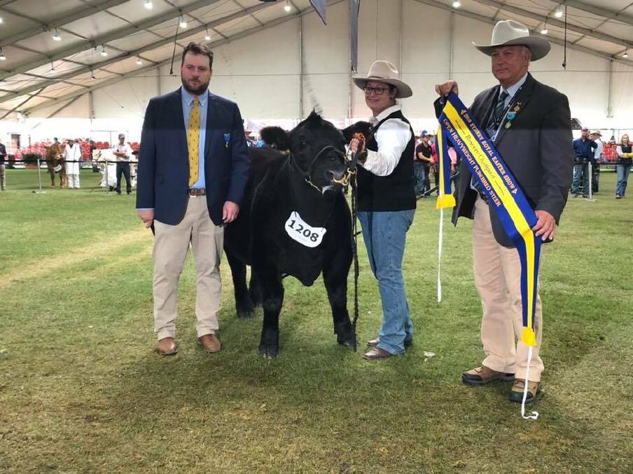 Judge Ben Davies from Thomas Foods International and Lyn Richards at the halter. Photo supplied
