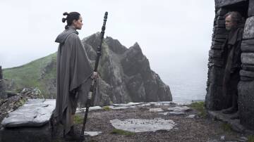 Daisy Ridley's Rey meets with jaded hero Luke Skywalker (Mark Hamill) on a secluded island in Star Wars: The Last Jedi
