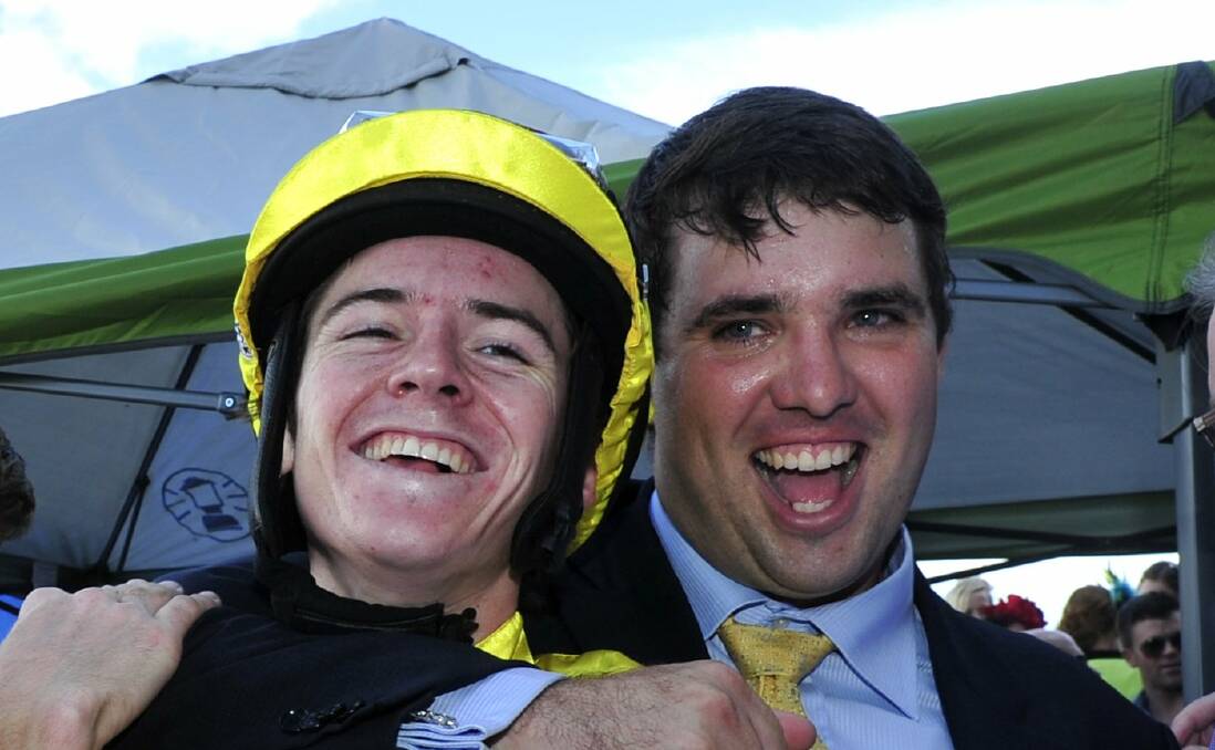 BACK: Sam Kavanagh, right, with jockey Jason Collett after a win in 2014. Picture: Canberra Times