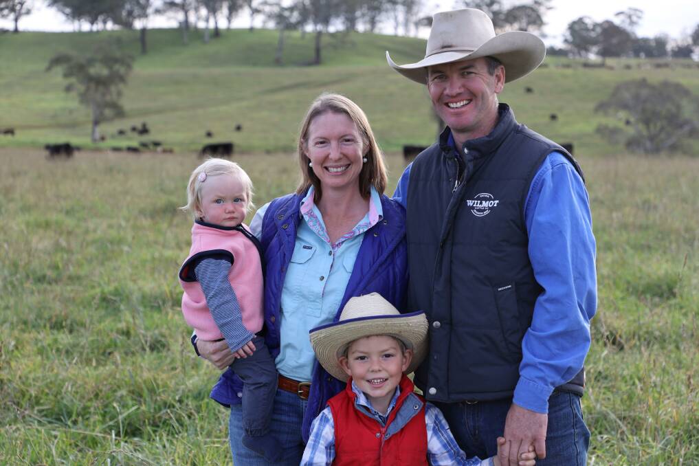 INNOVATIVE FARMING: Wilmot Cattle Co's Stuart Austin, wife Trisha Cowley, with children Harry, 5, and Poppy, 1. The family recently sold carbon credits, stored in their soil, to international company Microsoft.