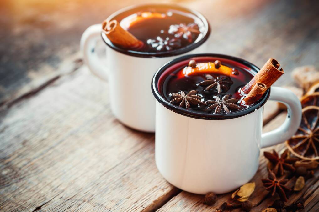 It's best to serve mulled wine in mugs with handles and remind guests how hot the liquid is. Picture: Shutterstock