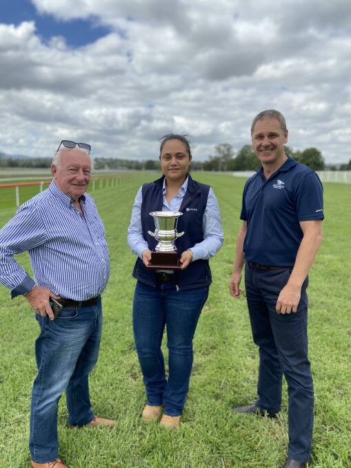 COMEBACK: Jim Rodger with Malabars manager of Health, Safety, Environment and Community, Donna McLaughlin,and Duane Dowel (left to right) with the cup trophy.