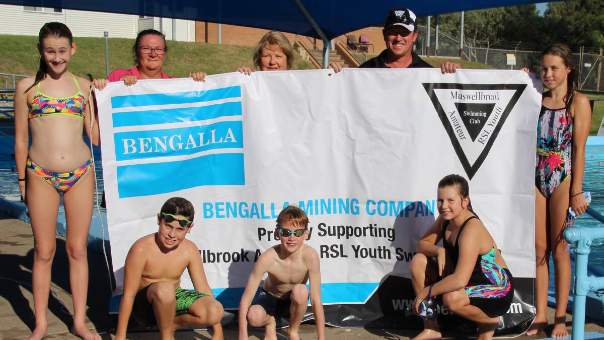 IN THE SWIM OF THINGS: Muswellbrook Amateur RSL Swimming Club coach Monique Sneddon and president Russell Hartin with Bengalla community relations specialist Debbie Day and young members of the organisation.