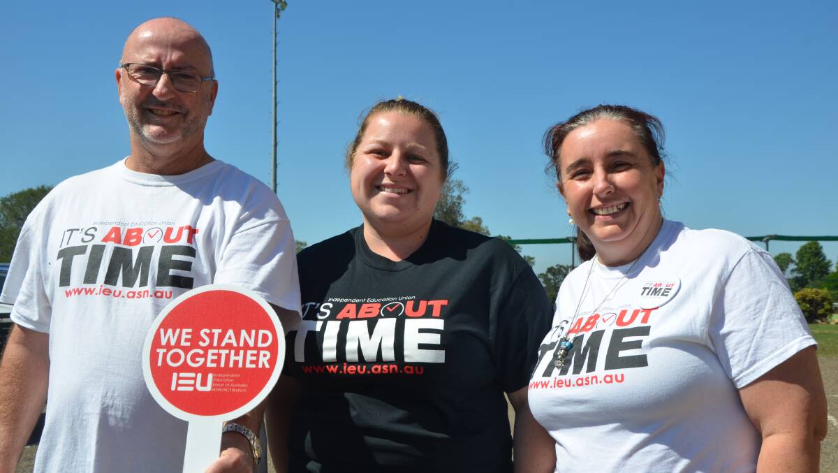 UNITED STAND: St Joseph’s High School Aberdeen teacher Vinnie Cooper with Samantha Hartcher (St James’ Primary School, Muswellbrook) and Mary-Jean Cooper (St Mary’s Primary School, Scone). 