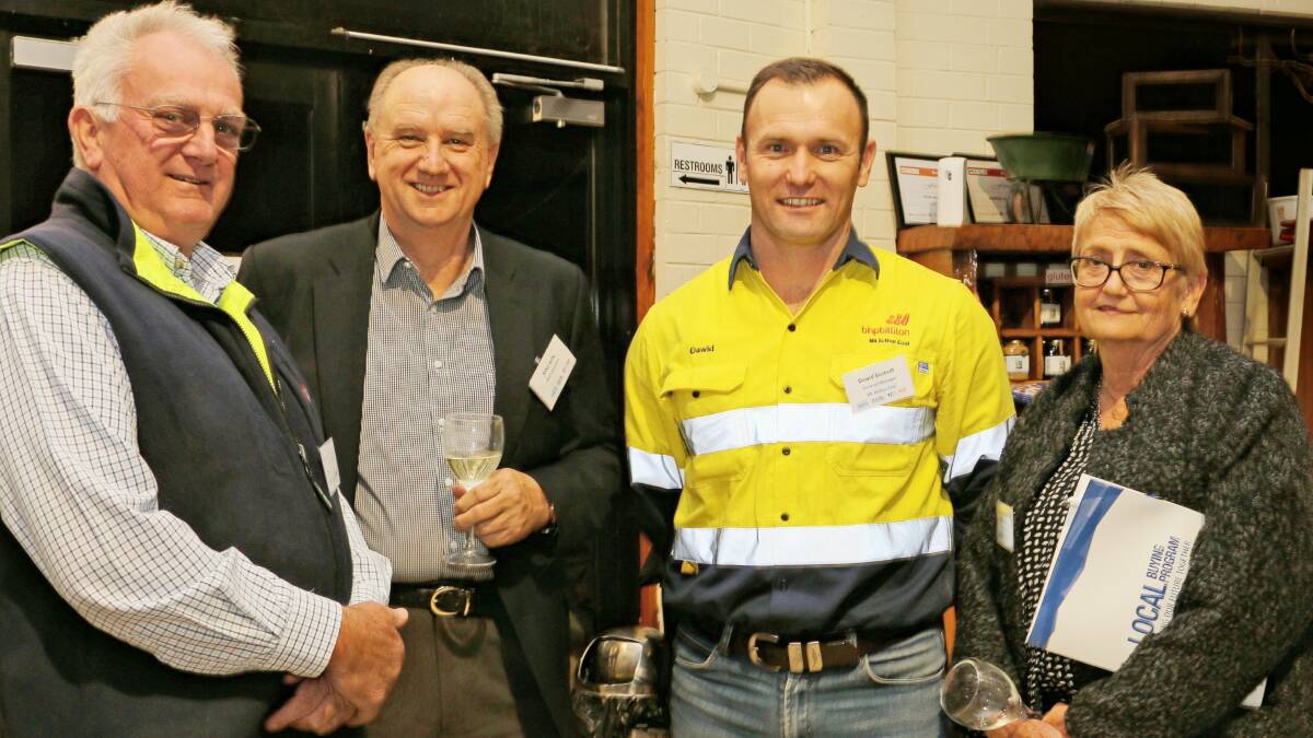 LAUNCH: Simon Downes (Muswellbrook Security Services – supplier to BHP’s Local Buying Program), Muswellbrook Chamber of Commerce and Industry (MCCI) president Mike Kelly, BHP Mt Arthur Coal general manager Dawid Boshoff and MCCI secretary/treasurer Lorraine Skinner at Hunter Belle Cheese on Monday night.