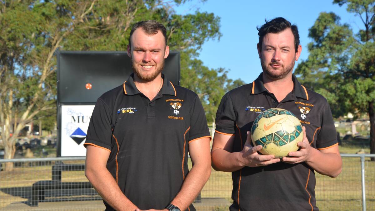 ON THE BALL: Muswellbrook RSL Eagles Football Club’s Brodern Adam-Smith and Andrew Spradbrow at the Eagles Nest during the week.