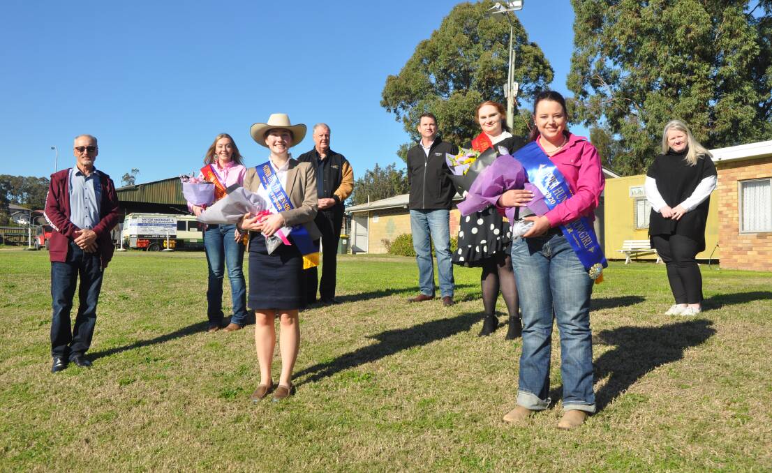 THANK YOU: Upper Hunter Show Society president Keith Googe with, from left, Emily May, Katie Sutcliffe, Daryl Egan (Muswellbrook RSL Club), Nick Slater (Mangoola), Rolanda Clout-Collins, Ally Morrison and Andrea Burns (Chocolate & Moss Florist) at the Muswellbrook Showground.