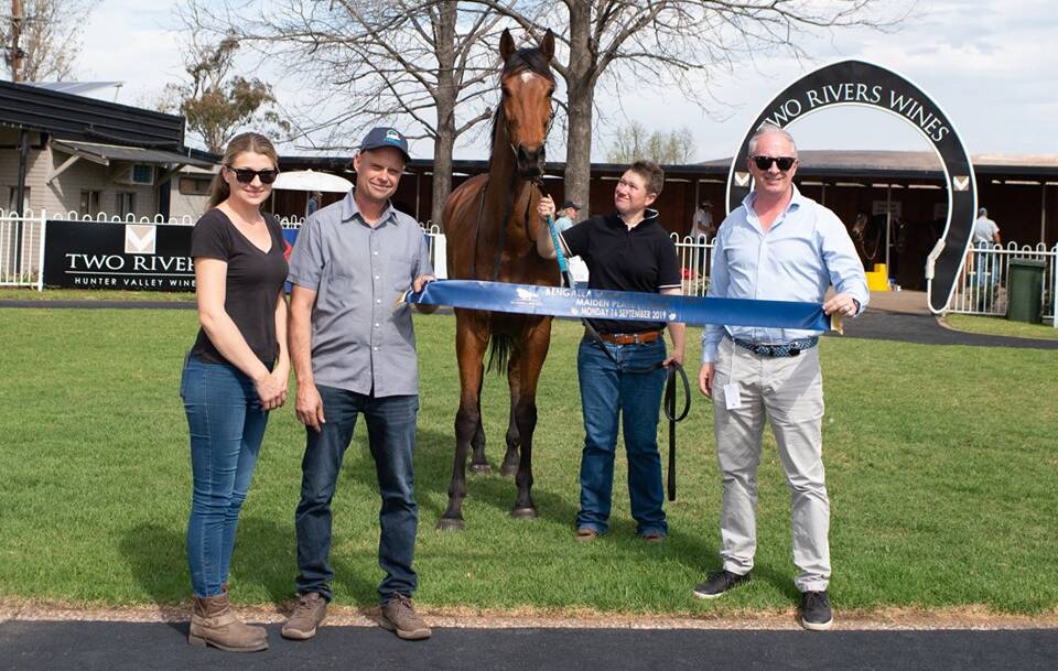 Muswellbrook trainer Stephen Gleeson (second from left) at his home track on Monday. Pic: KATRINA PARTRIDGE PHOTOGRAPHY
