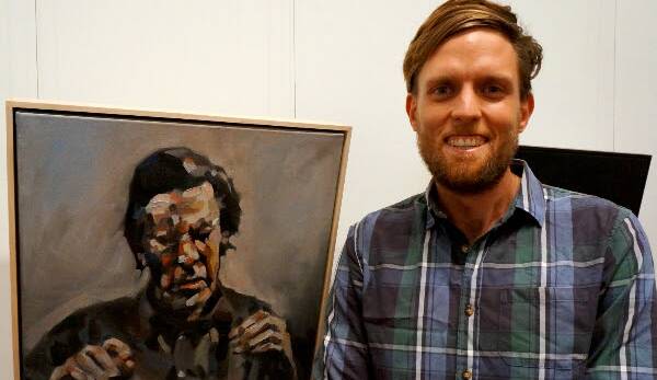 PRESTIGIOUS: Nick Ferguson with his winning work, Swimming (Bruce Spence), at the 43rd Muswellbrook Art Prize.