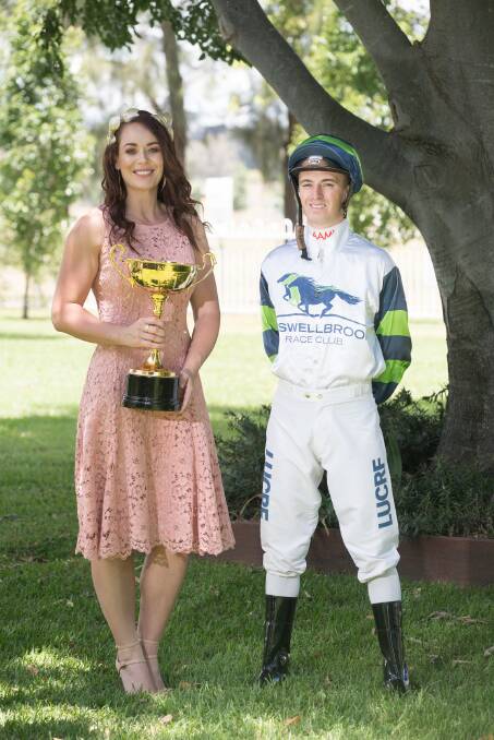 IN FINE FETTLE: 2016 Fashions on the Field winner Kim Fairweather and prominent Sydney-based jockey Josh Adams are ready for today’s Muswellbrook Gold Cup meeting.