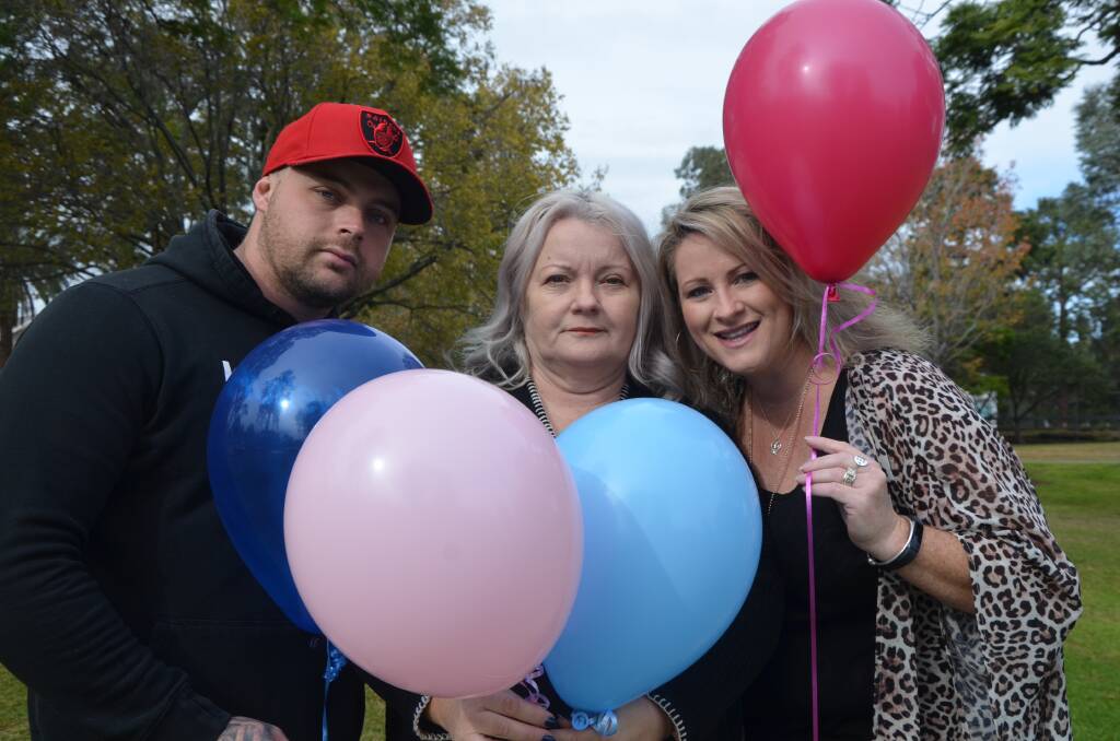 FAMILY TIES: Harley Fordham, De-anne Douglas and Kylie Spelde with the bio-degradable balloons that will be released at a special event in Muswellbrook next month.