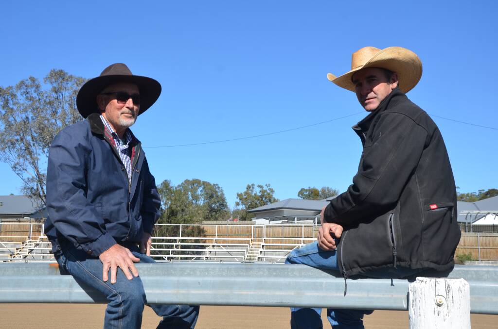 Upper Hunter Show Society Inc president Keith Googe and Muswellbrook Charity Rodeo president Brad Singleton