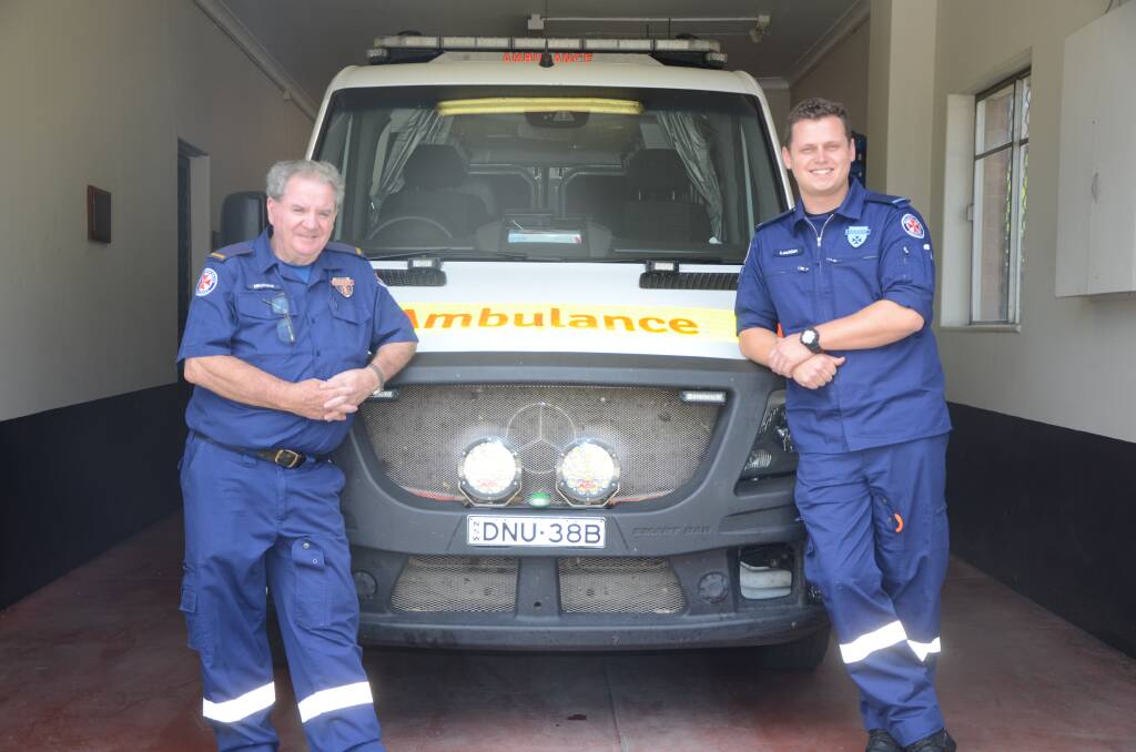 MASTER AND APPRENTICE: Muswellbrook NSW Ambulance paramedic Michael Fitzpatrick, who recently celebrated 40 years on the job, and newcomer to the station, Lachlan Fowler.