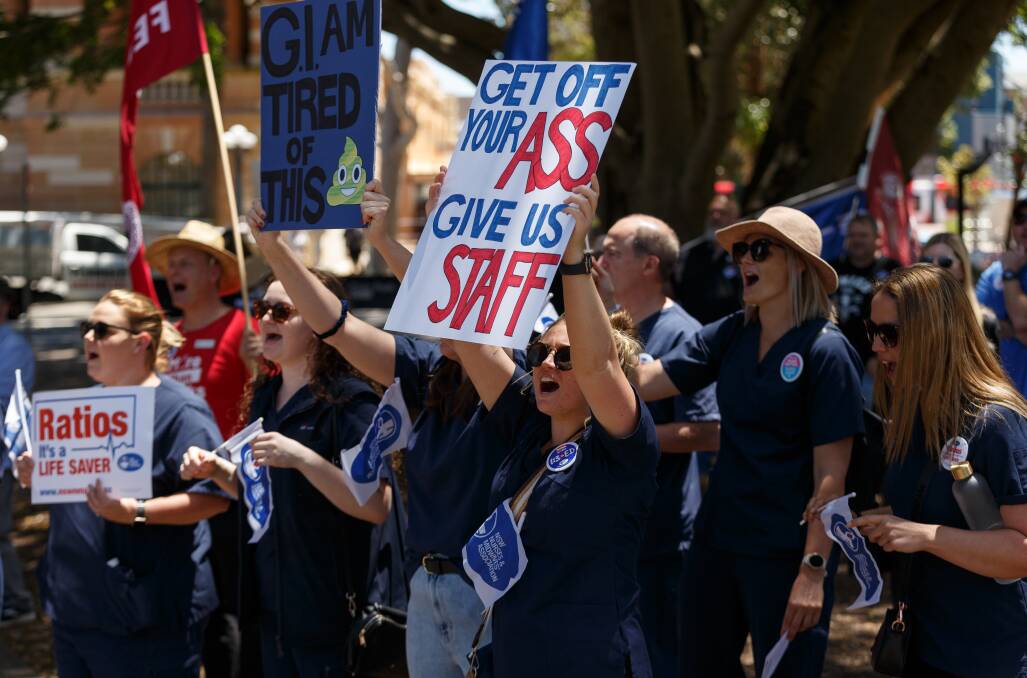 Nurses and midwives rally at Newcastle's Civic Park during their fourth 24-hour strike action this year. Picture by Max Mason-Hubers