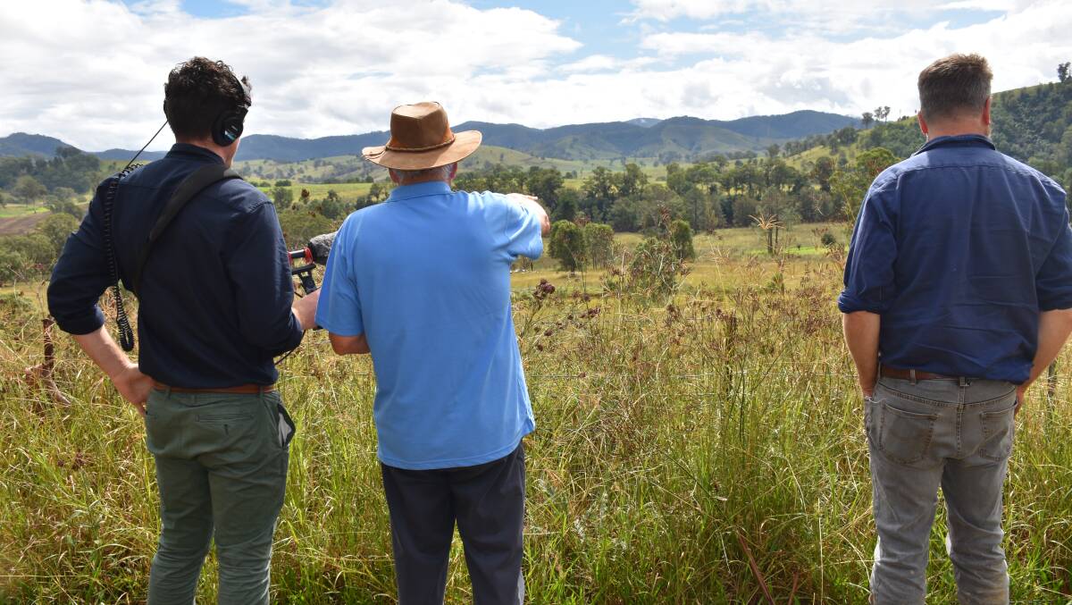 David Marston showing local farmer James Hooke and I where the solar array will be constructed on his property at Tugrabakh. Picture: Laura Corrigan