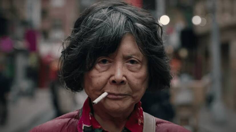 Tsai Chin as a chain-smoking cynical octogenarian in Lucky Grandma. Picture: Good Deed Entertainment