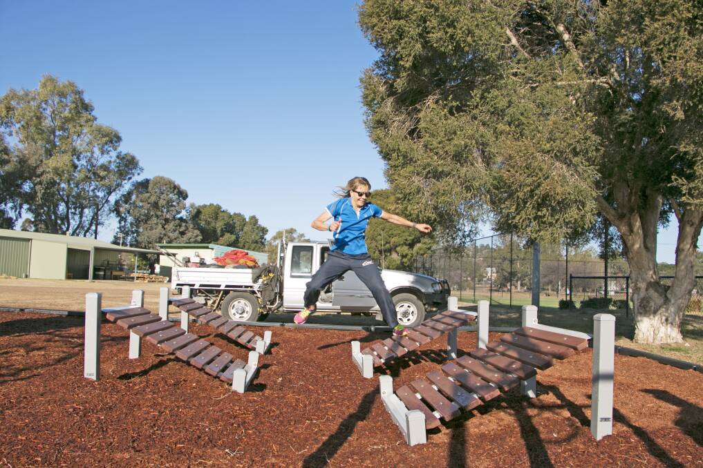 FUN FACILITY: Upper Hunter Shire Council's sports participation officer Nicky Western having a go on the new 'Urban Warrior Course' at Aberdeen's Jefferson Park.