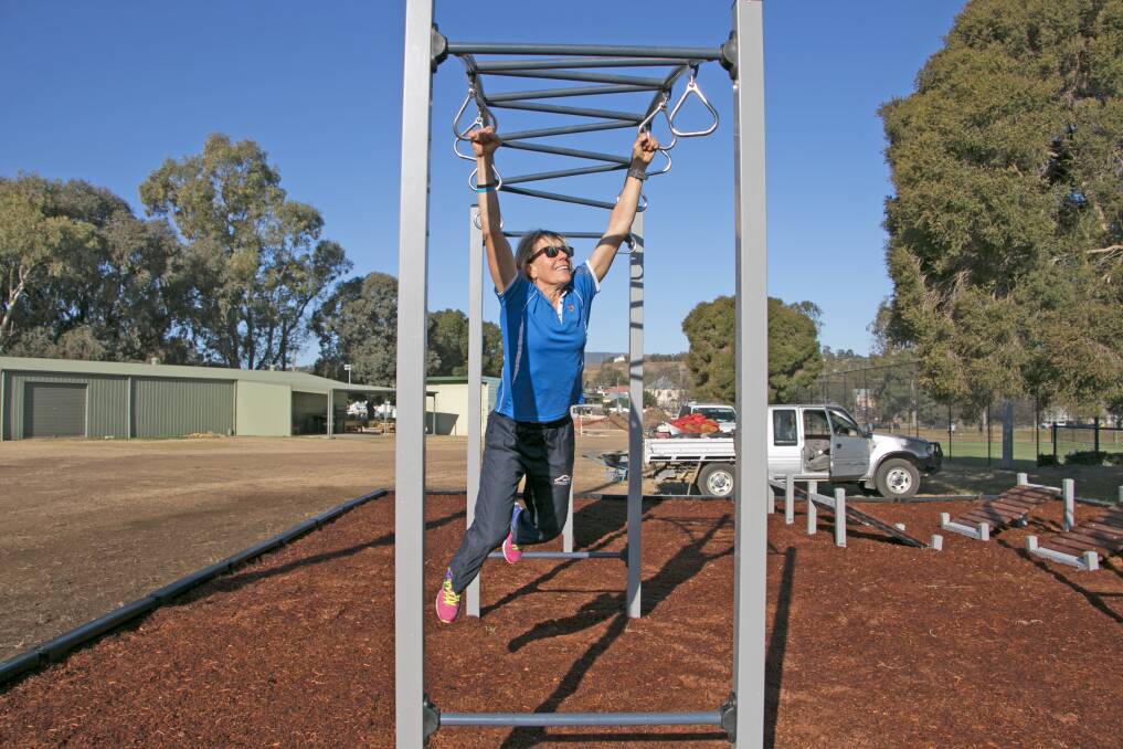 FUN FACILITY: Upper Hunter Shire Council's sports participation officer Nicky Western having a go on the new 'Urban Warrior Course' at Aberdeen's Jefferson Park.