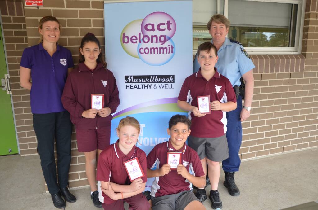 JOINT EFFORT: ABC coordinator Carly Hughes and senior constable Sheree Grey launching the ABC Passport at Muswellbrook South Public School.