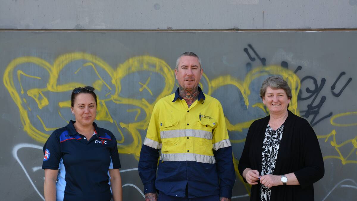 TAG TERROR: PCYC's Torie Newman (left), Muswellbrook Shire Council graffiti officer Ryan Derrington and senior constable Sheree Gray are committed to removing the town's eyesores. 
