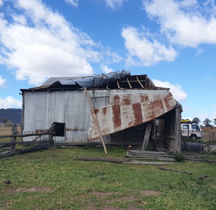 QUICK RESPONSE: Muswellbrook SES was required to quickly prevent this damaged roof from tearing any further. Pic: Muswellbrook SES