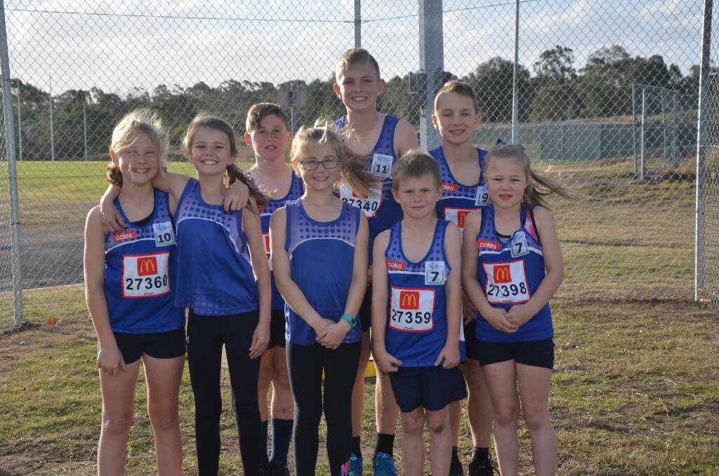 SUPER SMILES: The kids at Muswellbrook Little Athletics are thrilled to have received their new discus cage.