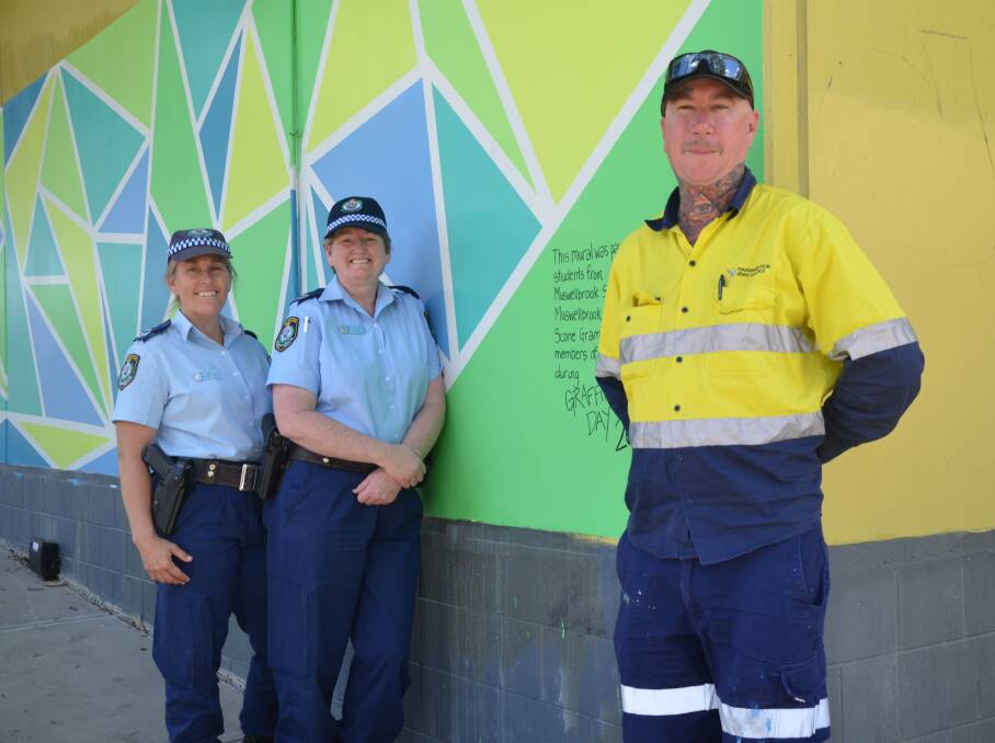 GRAFFITI GONE: Keli Bastick, Sheree Gray and Ryan Derrington played a role in this year's National Graffiti Removal Day.