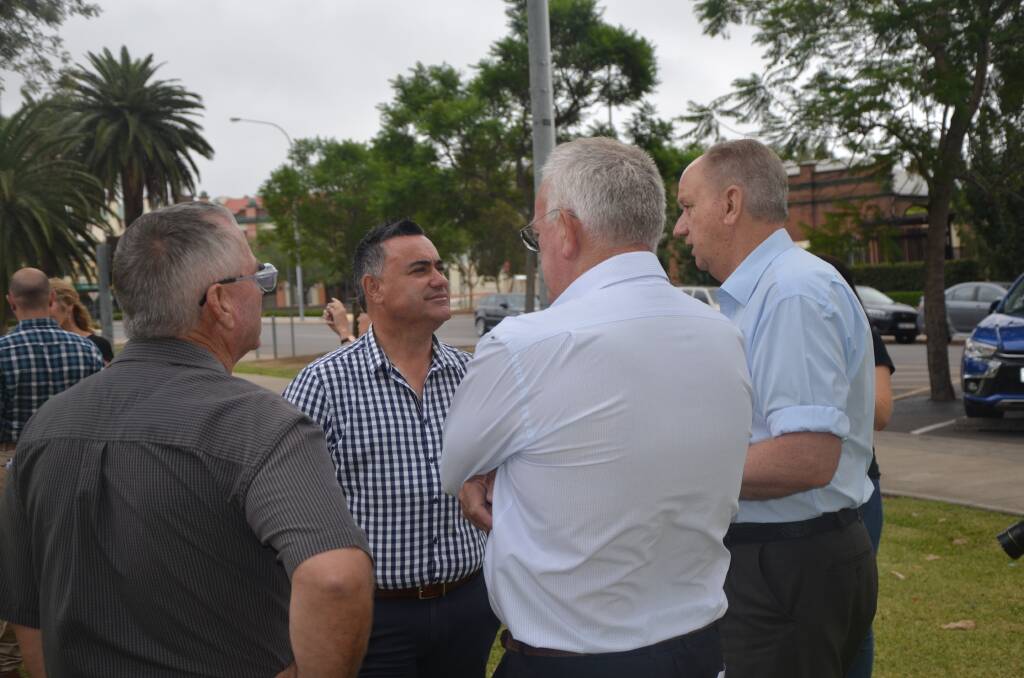 PASSING BY: Muswellbrook Chamber of Commerce and Industry president Mike Kelly (right) was pleased with John Barilaro's (centre) announcement on Thursday.