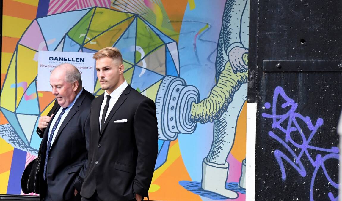 Back in court: Jack De Belin (right). Picture: AAP Image/Peter Rae