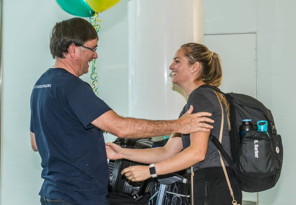 Kelsey-Lee Barber and dad Keith at Canberra airport. Picture: Karleen Minney