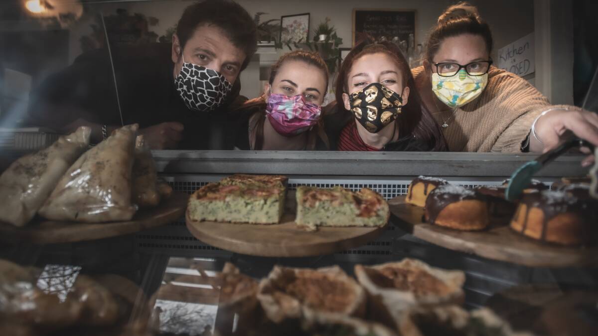 Millhouse Cafe owners Muhannad Hbaika (left) and April Hbaika (right) and staff members Jasmine Baker and Manal Hbaika wear home made face masks. Picture: Karleen Minney
