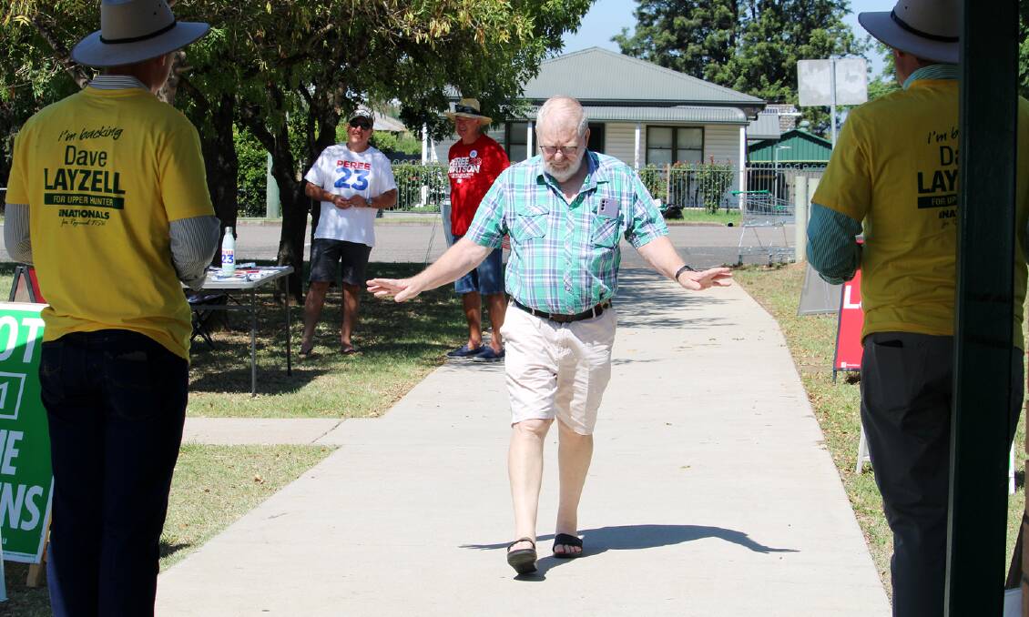 PHOTO GALLERY: Pre-poll voters came and went quickly from Muswellbrook's Stan Thiess Centre on March 18 to avoid the heat.