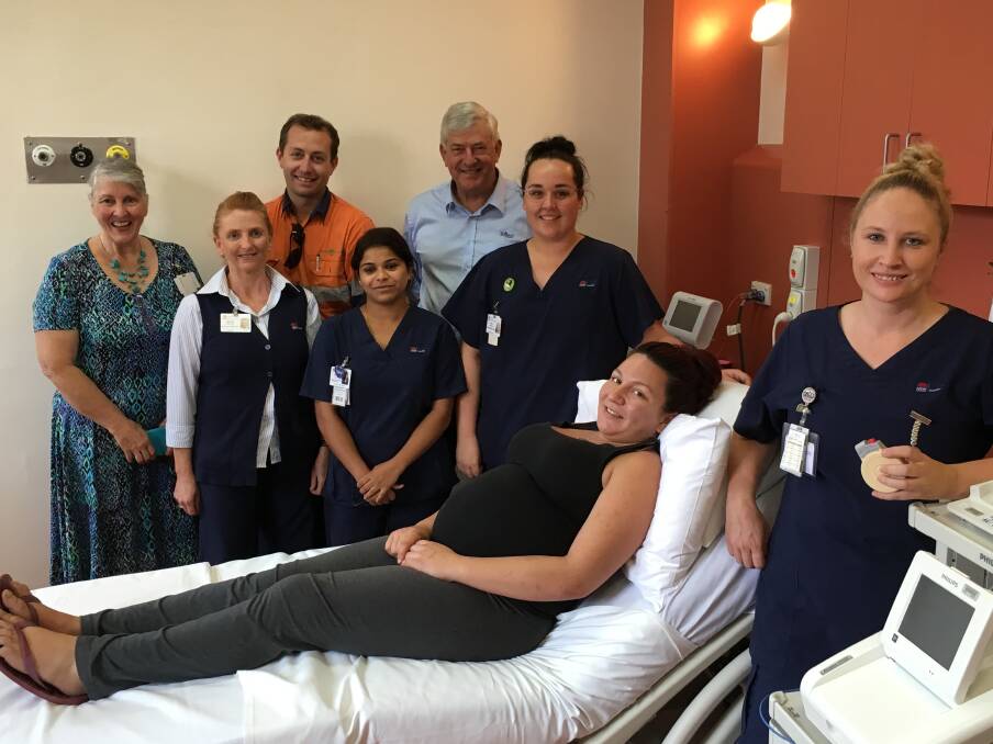 NEW FETAL MONITOR: The Bloomfield Group’s Luke Murray and John Richards (rear) with Singleton Hospital staff and mum-to-be Juanita Silk.

 