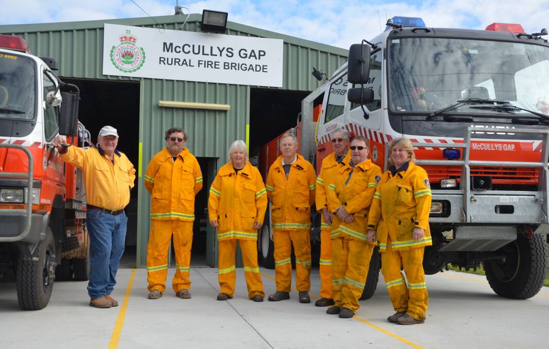 DISAPPOINTED: McCullys Gap RFS volunteers Ron Hammond, Steve Garland, Narelle Robinson, Richard French, John Clement, Michael Keegan and Janelle French.