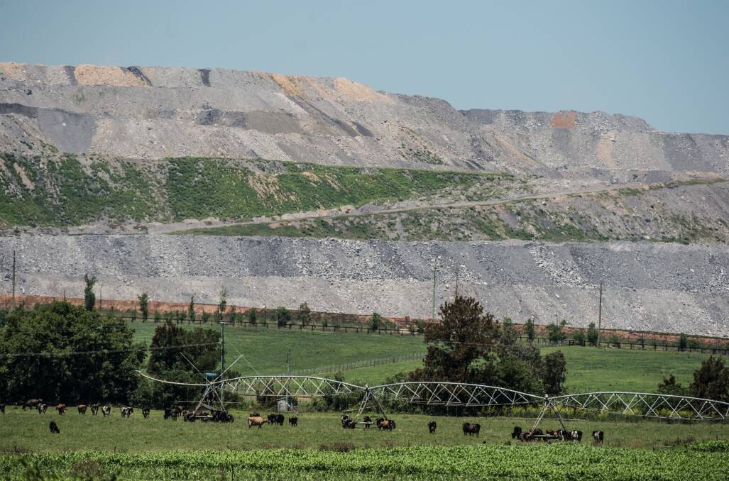 Impact: Mt Arthur coal mine near Muswellbrook showing the "traditional" benching method of rehabilitating overburden. 