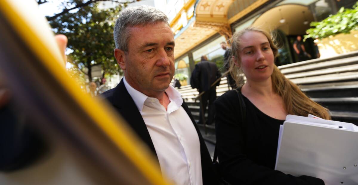 Fallen: Former winemaker David James leaves a Sydney court after charges linked to a major fraud investigation. 