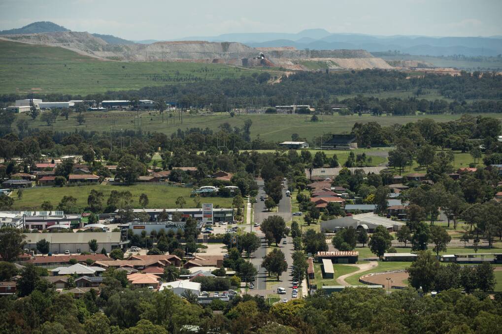 Close: The town of Muswellbrook showing Mt Arthur coal mine in the background.